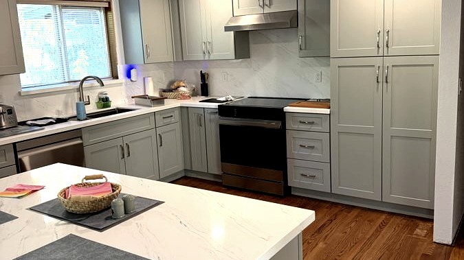Kitchen renovation, hardwood floor, shaker cabinetry, stone counters, by DA Interior Solutions