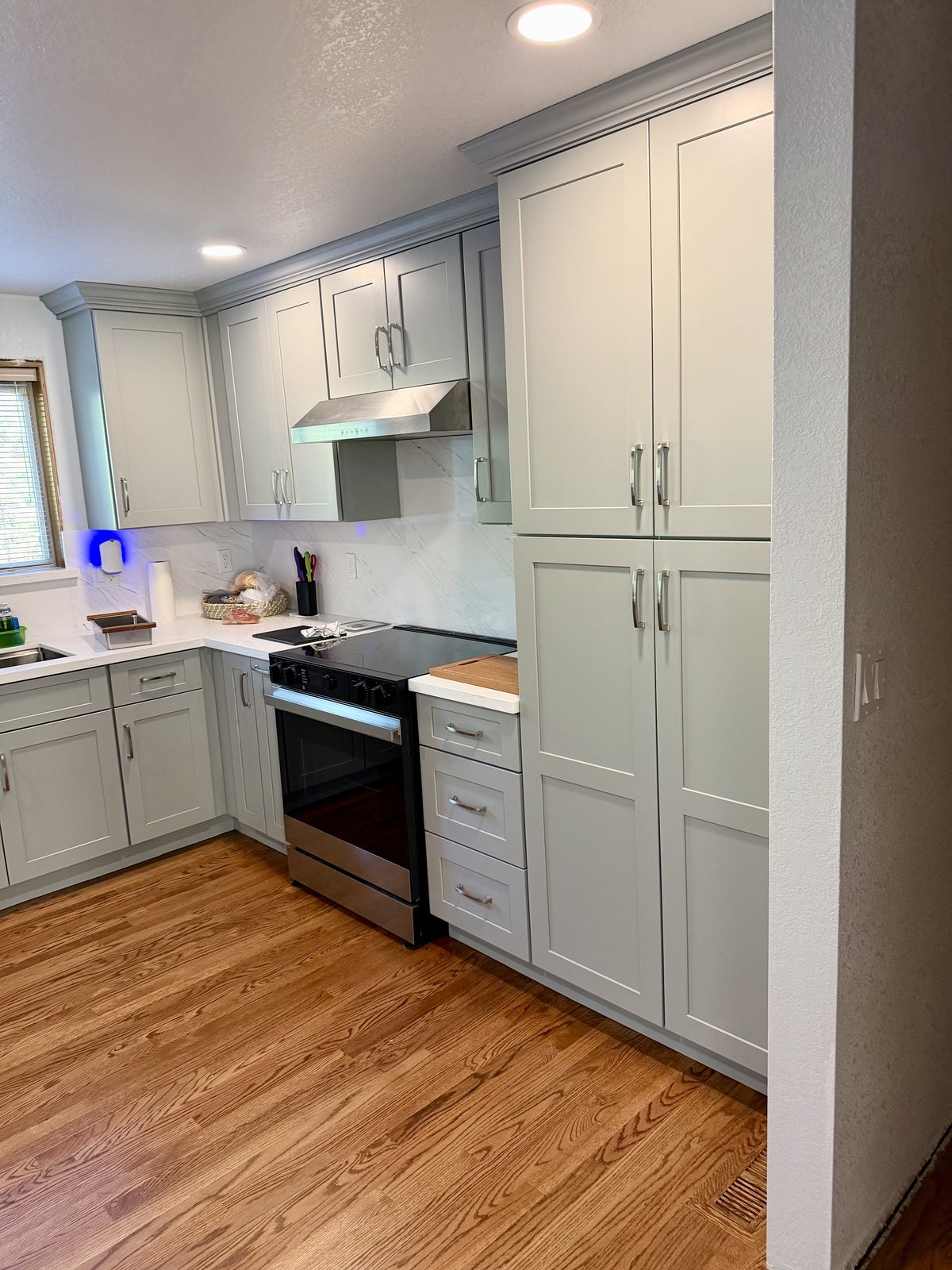 The pantry cabinet, fitted with pull-out drawers. Kitchen remodel in Lacey by DA Interior Solutions