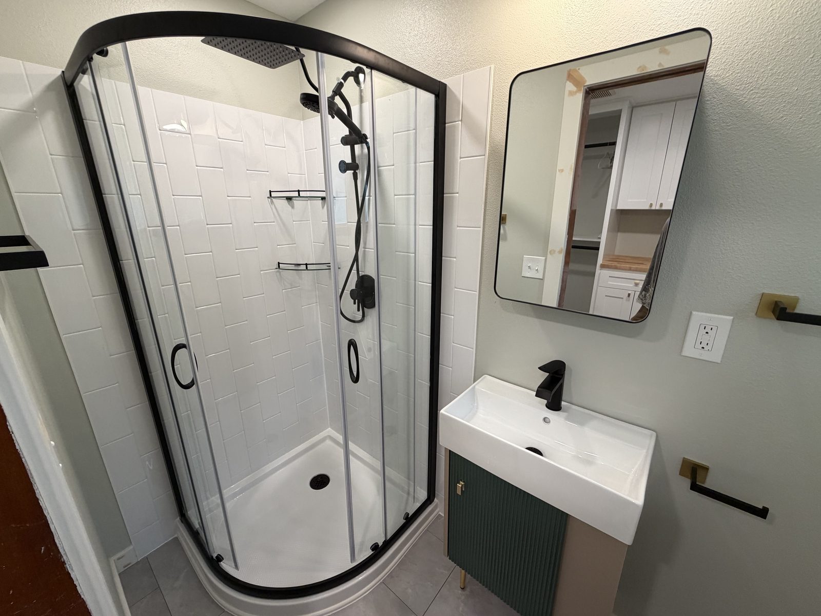 The shower stands where the closet was. Bathroom remodel in Puyallup by DA Interior Solutions